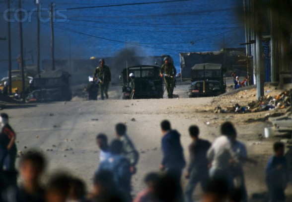 10 Feb 1988, Gaza, Gaza Strip --- Rebel Israeli and Palestinian fighters protest in the occupied territory of Gaza during the first Intifada. The Israeli administrative custody camp was closed and declared a military zone after violence broke out. --- Image by Patrick Robert/Sygma/CORBIS