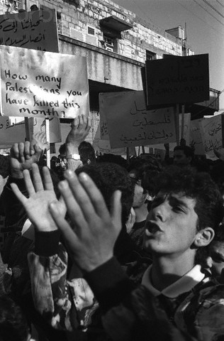 1988-1989, Nazareth, Israel --- Palestinian protest march in the town of Nazareth. --- Image by © Keith Dannemiller/Corbis