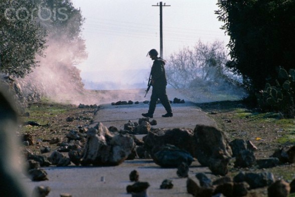 12 Jan 1989, West Bank --- Israeli settlers clash with the army in the West Bank during the Intifada. --- Image by  Ricki Rosen/CORBIS SABA