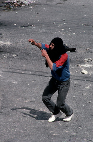 ca.1988 --- One of the many rocks hurled in the Intifada, by young masked Palestinians, in the West Bank town of Bet Sachour. | Location: Bet Sachour, Israeli Occupied Territories.  --- Image by David H. Wells/CORBIS