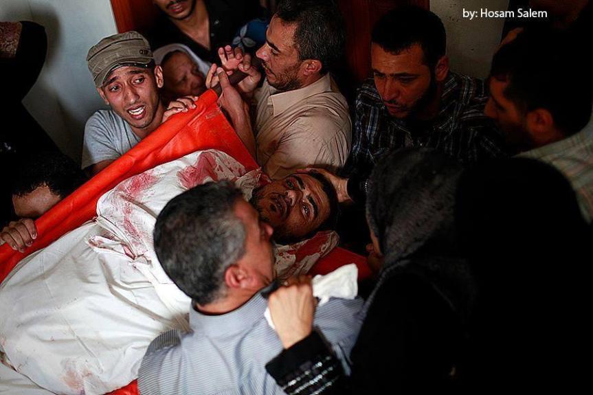 Funeral martyr journalist "Khaled Hamad" attacked by Israeli Forces at #Shijaia via @saidshouib  