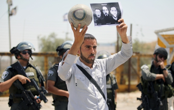 Solidarity with hunger striker Mahmoud Sarsak at Ofer - Palestinians staging a football match - Photo by WAFA